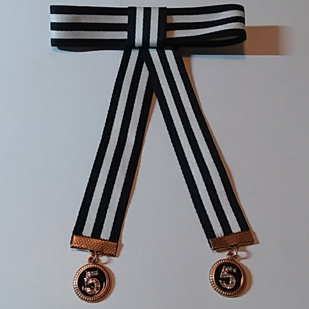 Black and white pin